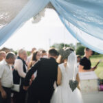 Beautiful,Stylish,Bride,And,Groom,Under,The,Wedding,Arch,Accept