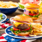 Homemade,Memorial,Day,Hamburger,Picnic,With,Chips,And,Fruit